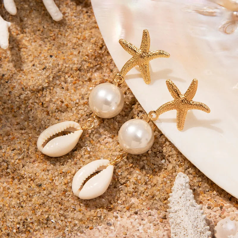 Aretes Estrella de Mar Cowrie